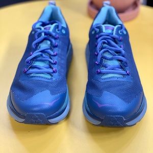 Blue like new Hokas. Comfortable running shoes with very little wear and tear.